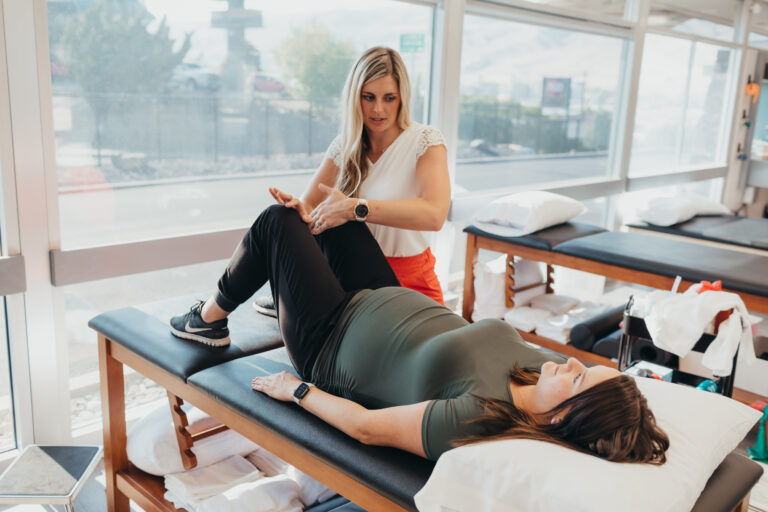 Physical Therapist working with a woman